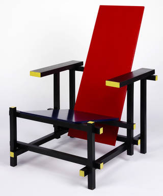 Photo of The Red Blue Chair, armchair, designed by Gerrit Thomas Rietveld, made by Gerard A. van der Groenekan, 1918, Netherlands. Museum no. CIRC.367-1970. © Victoria and Albert Museum, London