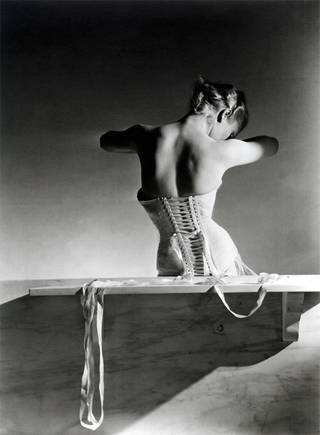 Photo of Mainbocher Corset (pink satin corset by Detolle), Horst P. Horst, Paris, 1939. © Condé Nast/Horst Estate