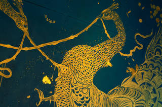 Detail of the golden peacock mural inside Darren Waterston's 'Filthy Lucre'