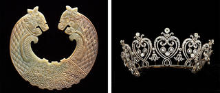 Left: Round, light coloured dragon shaped engraved plaque. Right: Silver tiara with heard shaped detailing. 