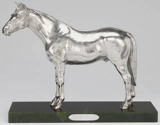 Silver statuette of a horse called Persimmon on a green nephrite stand