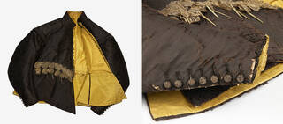 Black silk doublet displayed flat showing its bright yellow lining