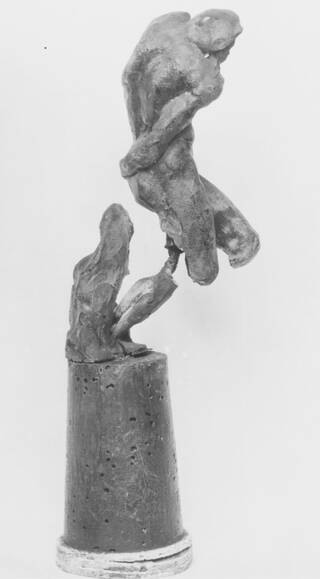 Black and white photograph showing damage to sculpture